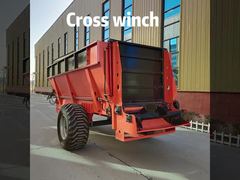 Cross winch fertilizer spreader